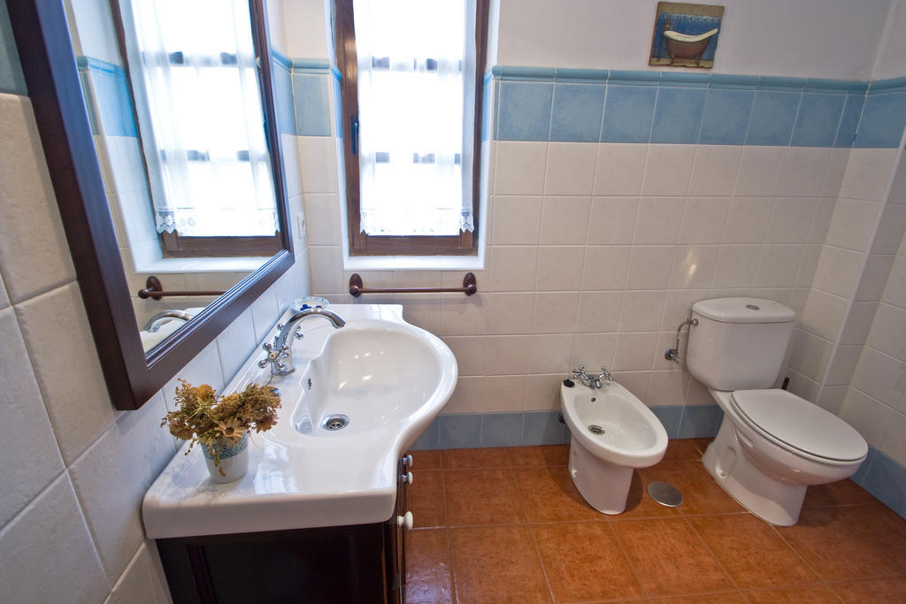 شقة Vivienda Casa Luisa كوميلاس الغرفة الصورة