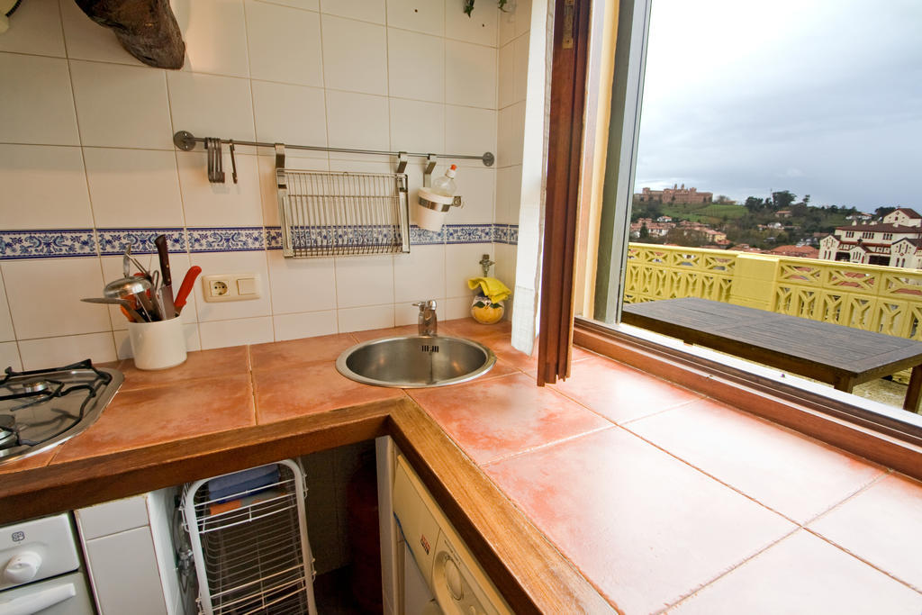 شقة Vivienda Casa Luisa كوميلاس الغرفة الصورة