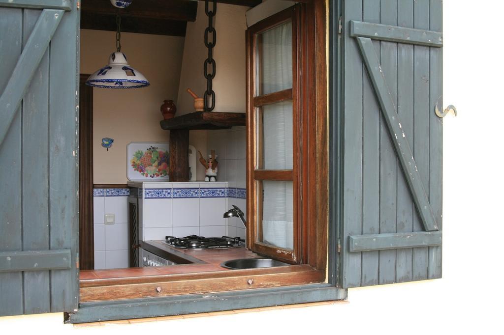 شقة Vivienda Casa Luisa كوميلاس المظهر الخارجي الصورة